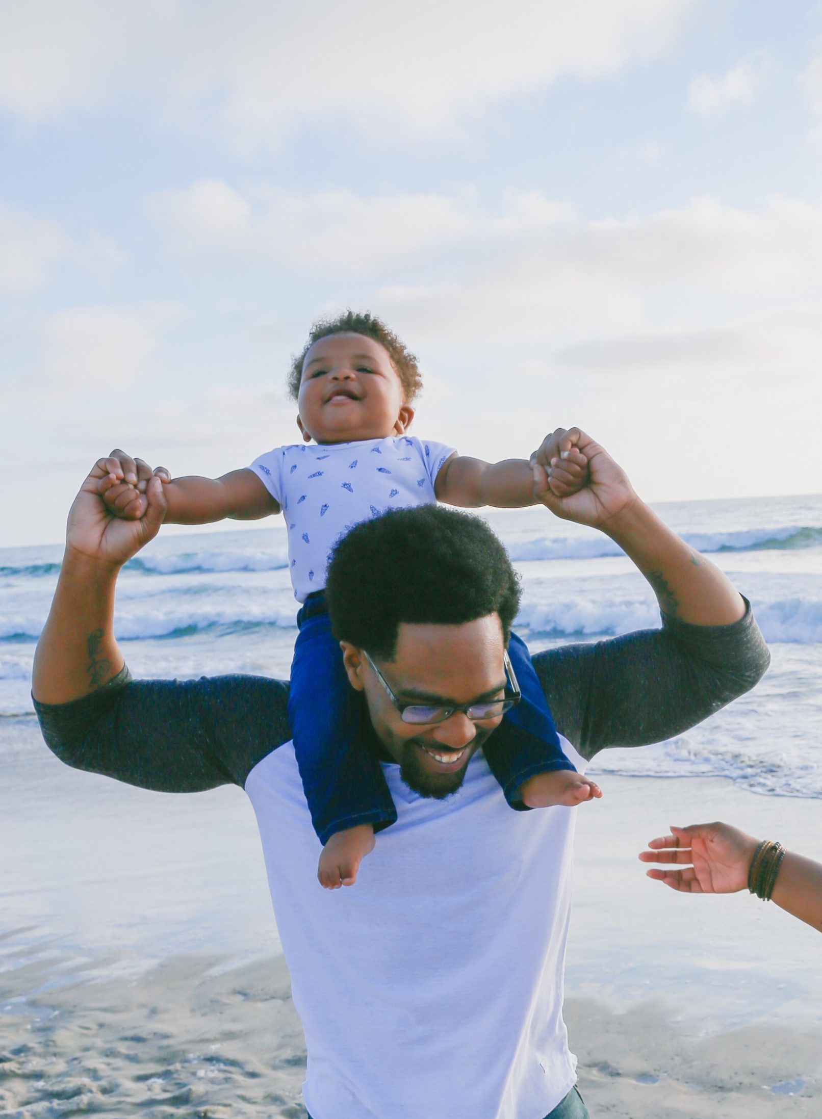 Smiling family on the beach