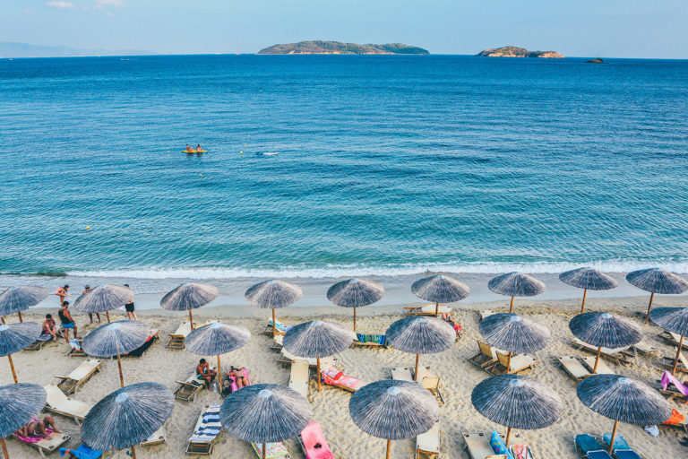 Overlooking from above a beach with umbrellas