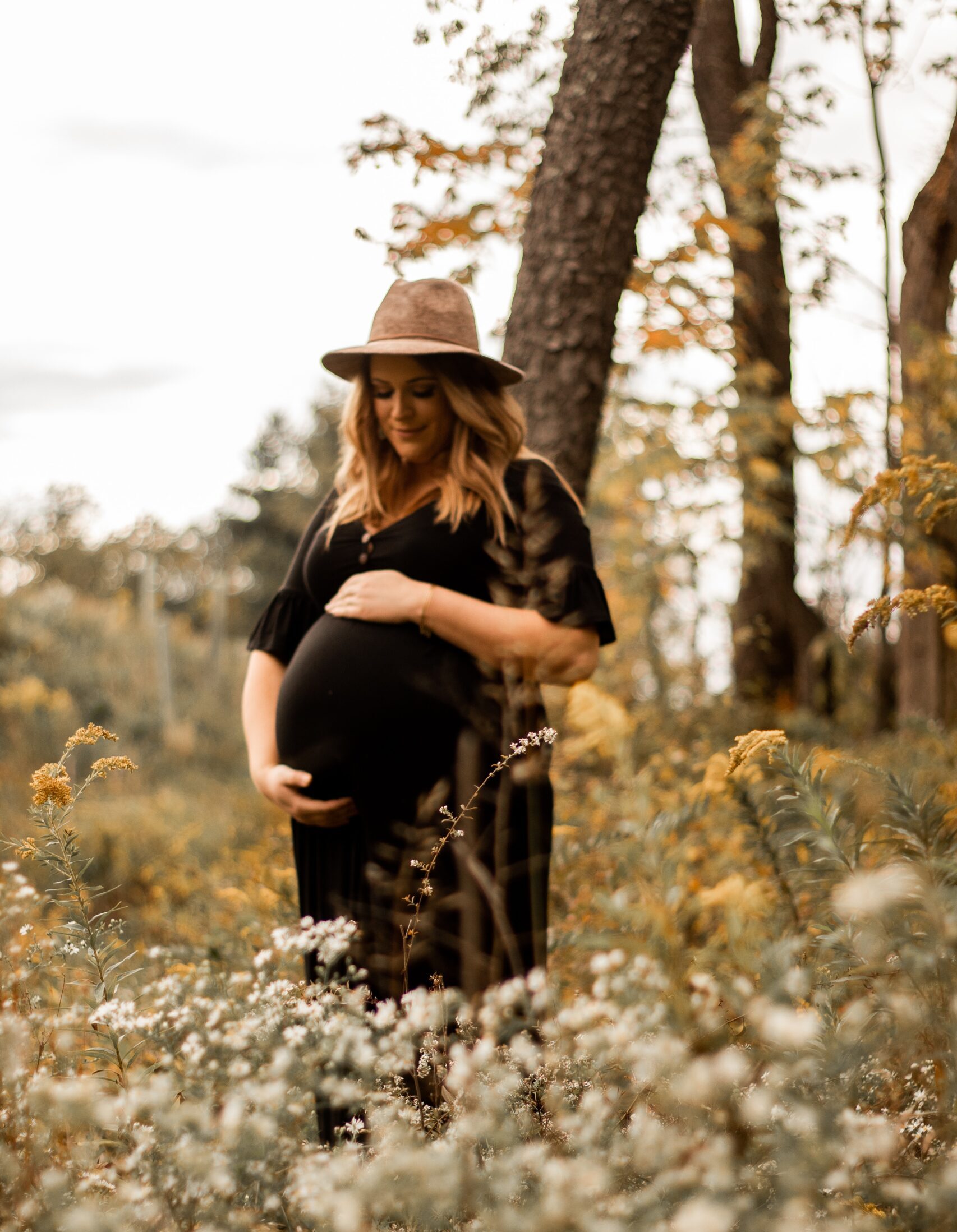 Pregnant woman in a field