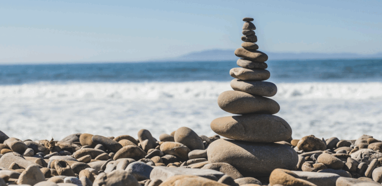 stacked rocks on a beach